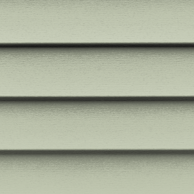 A close up of a green siding on a house.