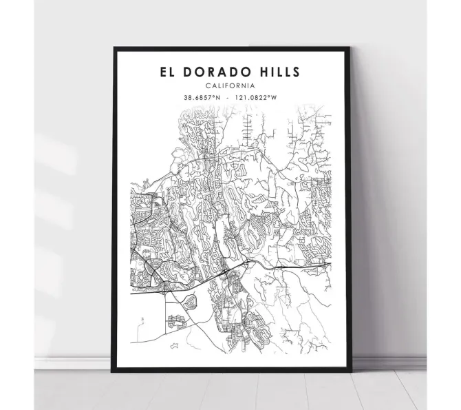 Framed black-and-white El Dorado Hills map print leaning against a white wall.