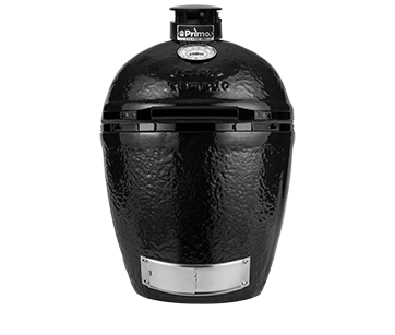 A black primo grill is sitting on a white surface.