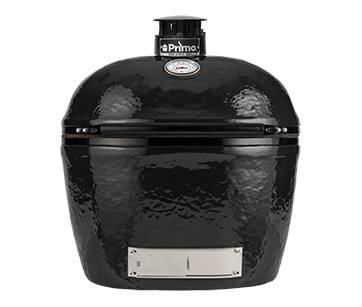 A black primo grill is sitting on a white surface.