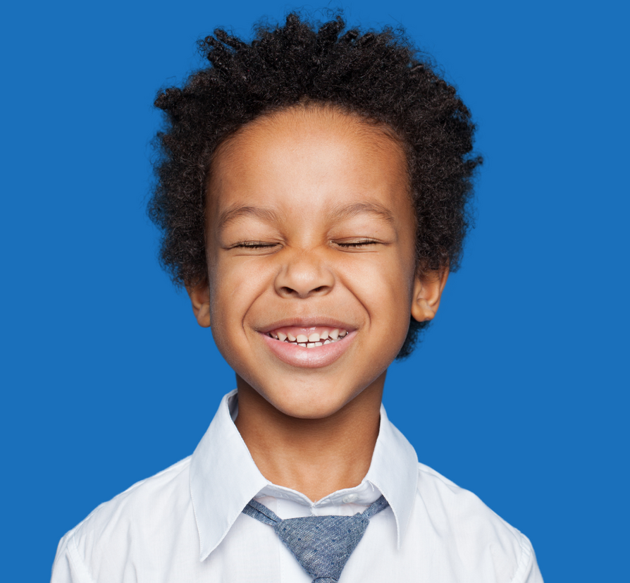 child smiling after teeth cleaning and sealants at our pediatric dentist practice in Lynnwood WA