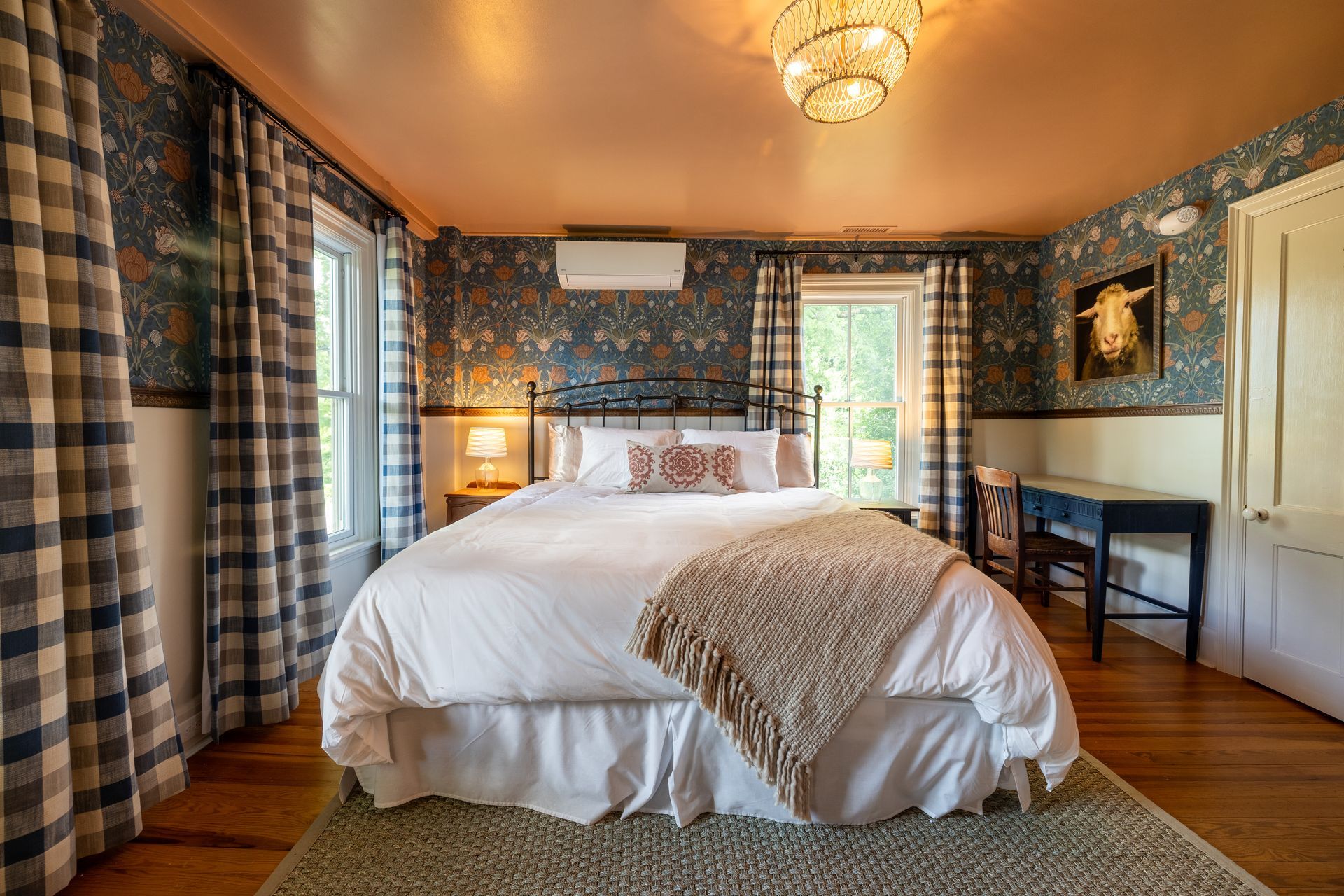 There is a large bed in the middle of the room.