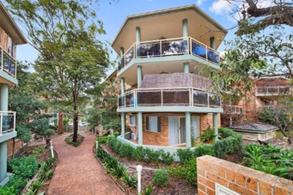 A large apartment building with a lot of balconies
