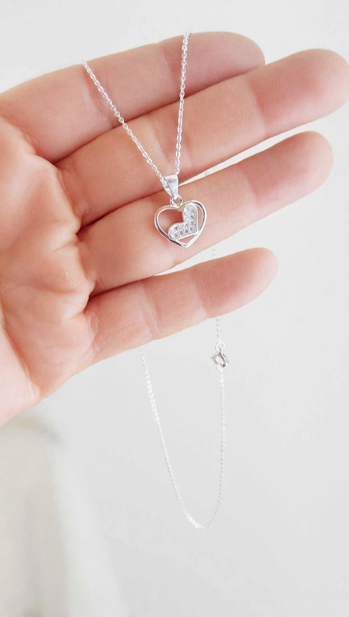 Colgante dos corazones
