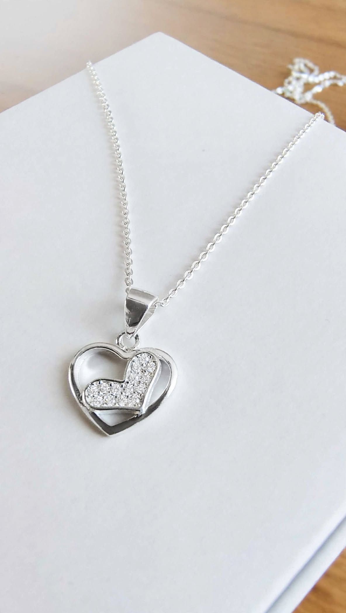 Colgante dos corazones