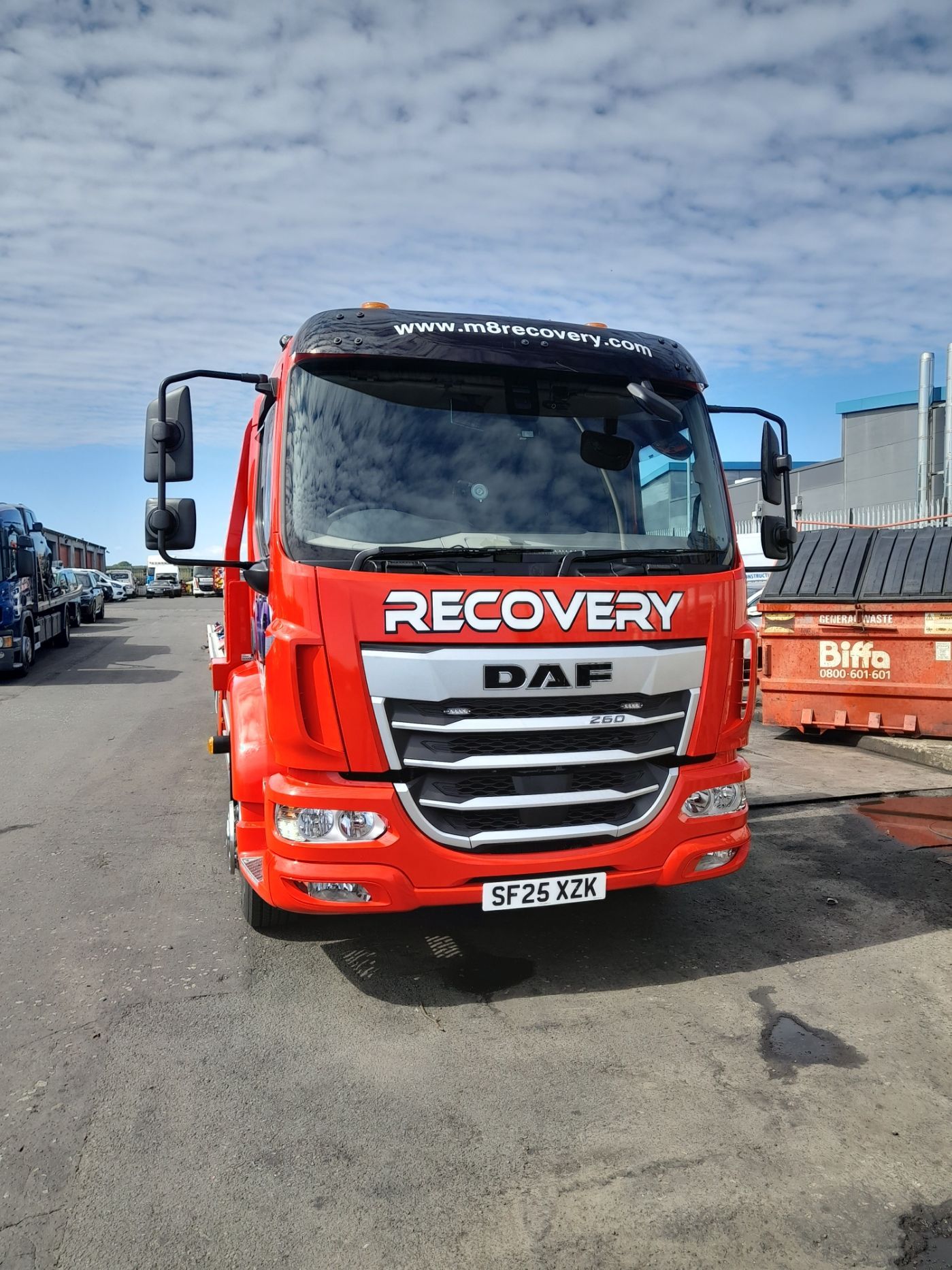 Red DAF recovery truck with 