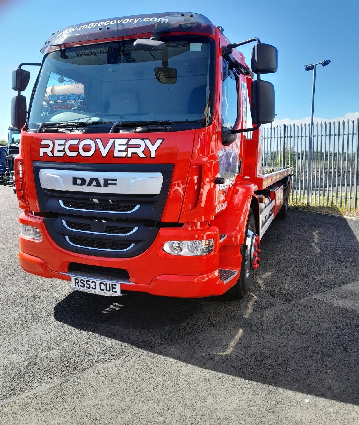 Red DAF recovery truck with 