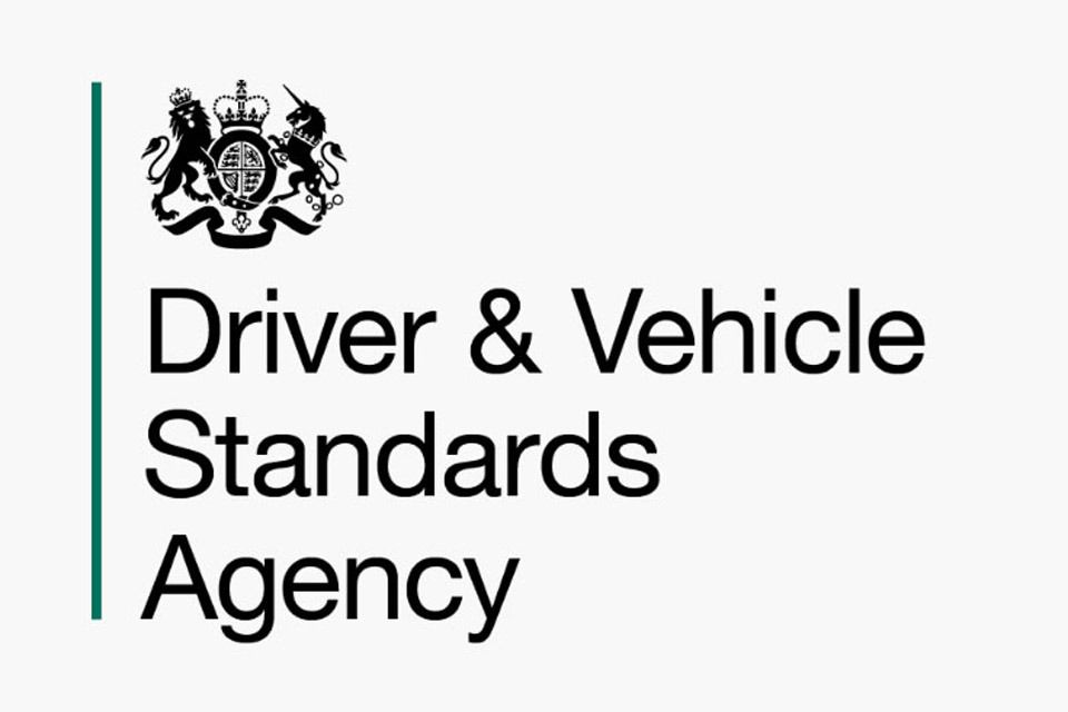 Logo of the Driver & Vehicle Standards Agency with a green vertical line and the royal coat of arms.