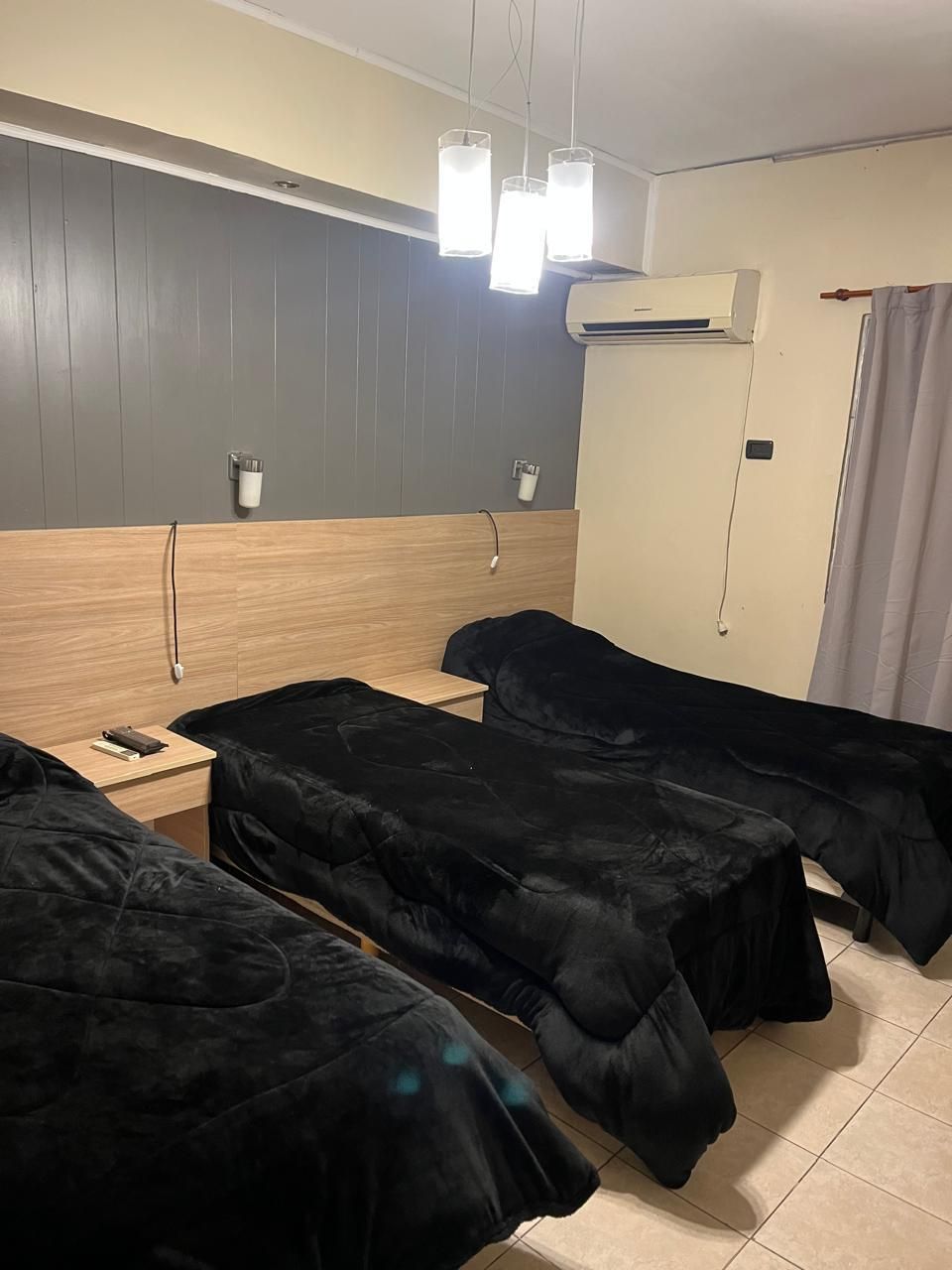 Habitación Standard - cama queen, cabecera en madera, vista Buenos Aires