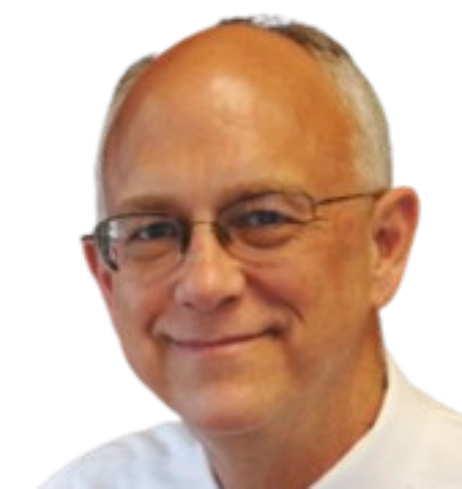 A man wearing glasses and a white shirt smiles for the camera