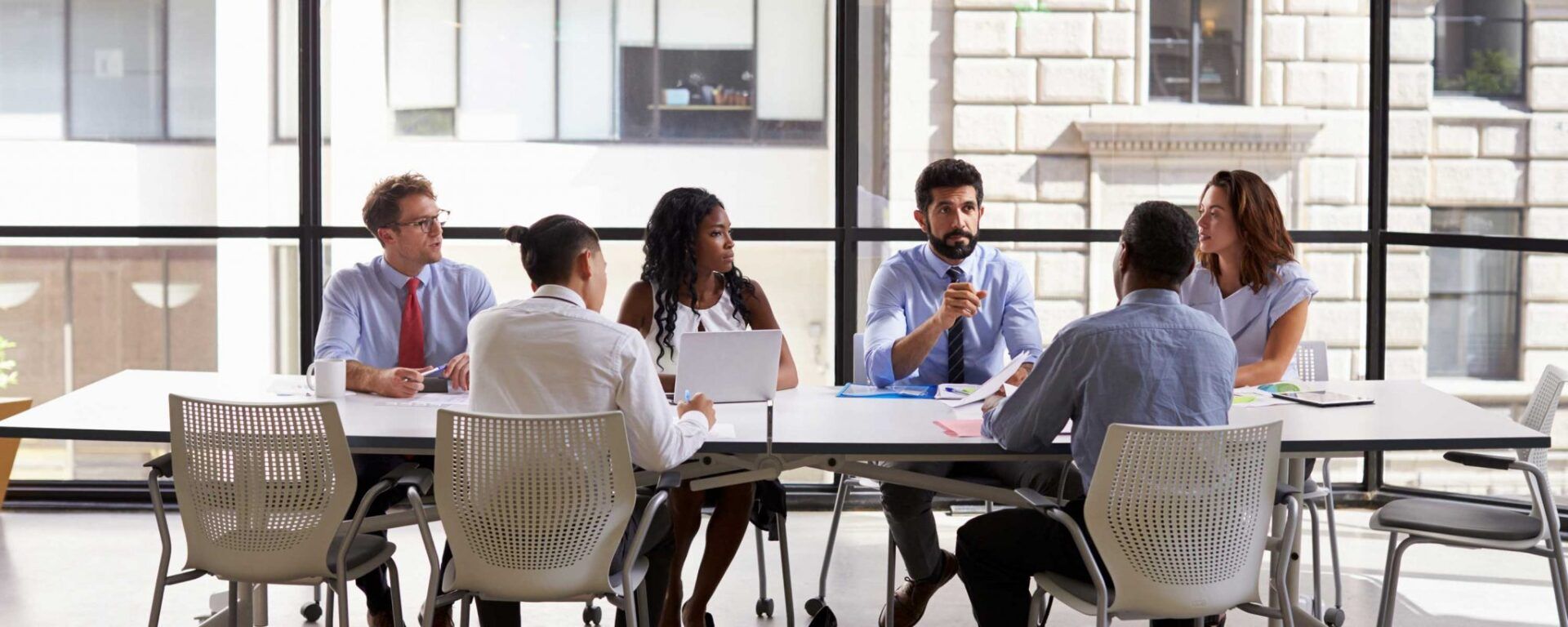 A board meeting in a conference room