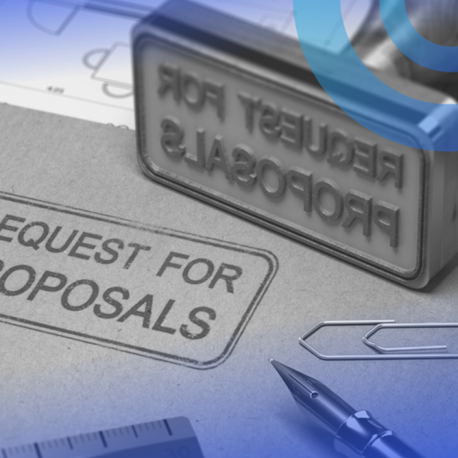 “Request for proposals” forms with a “Request for proposals” stamp and a pen on a desk