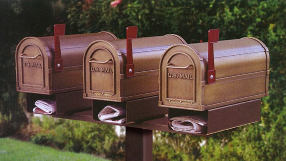 Three mailboxes on the same post