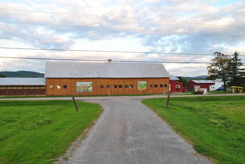 landscape photo of the event barn at isham family farms in vermont