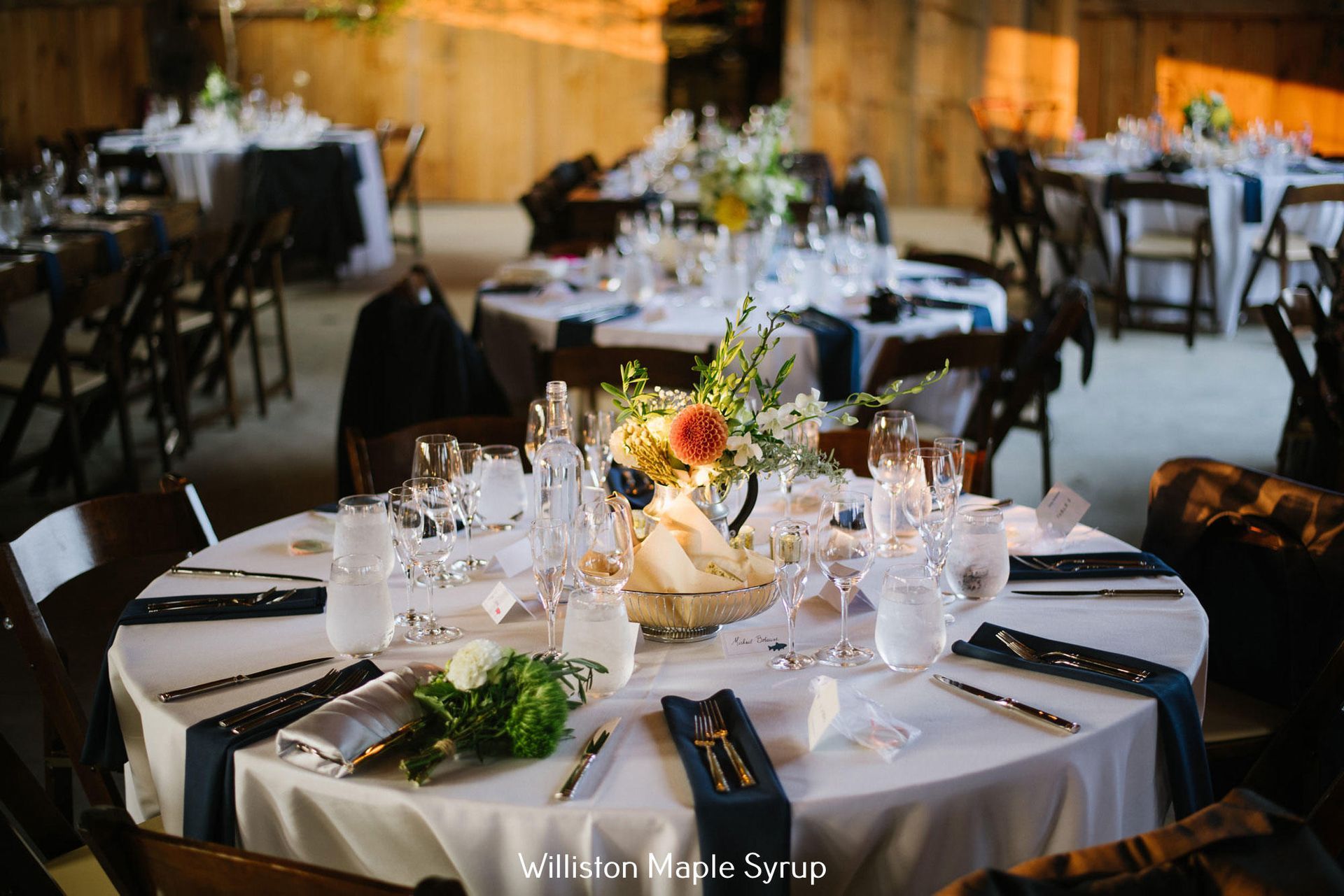 Image of a table set up for an event supporting the ECHO Leahy Center for Lake Champlain. 