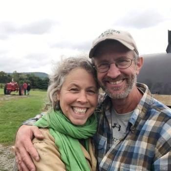 farmer mike isham and wife helen weston isham smiling with joy as they take care of their farm