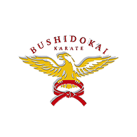 A logo for bushido kai karate with an eagle and a red belt.