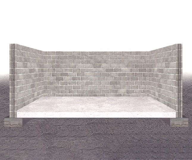 Empty concrete-walled alcove with a smooth floor, viewed head-on against a gray ground.