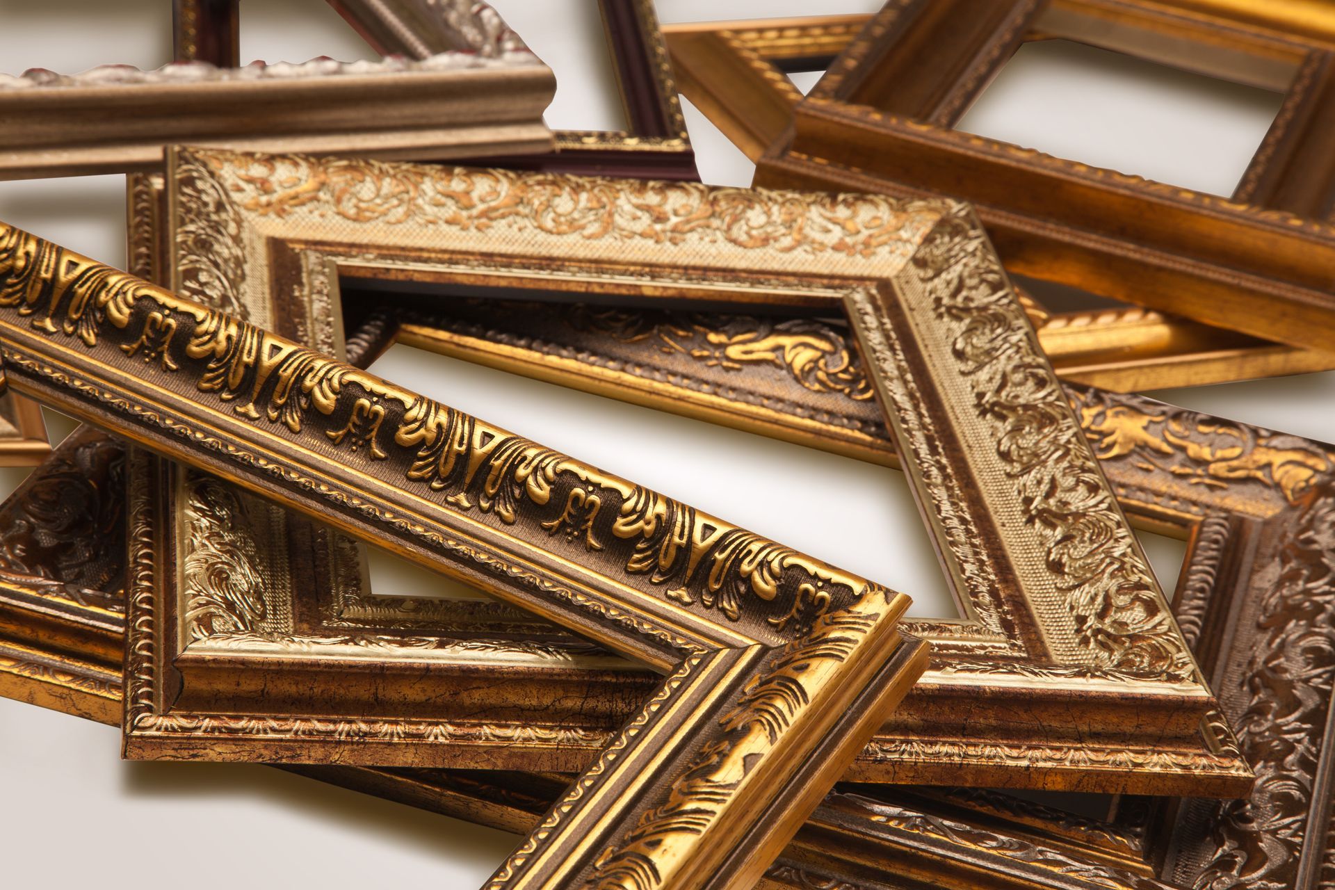 Heap of gold antique frames.