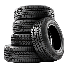 Stack of black car tires, with one leaning in front on a white background
