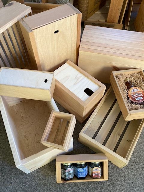 A bunch of wooden boxes are stacked on top of each other