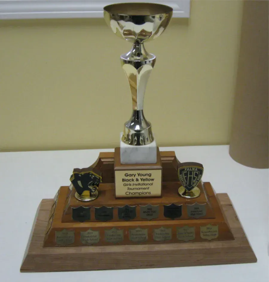 A trophy that says carl young on it