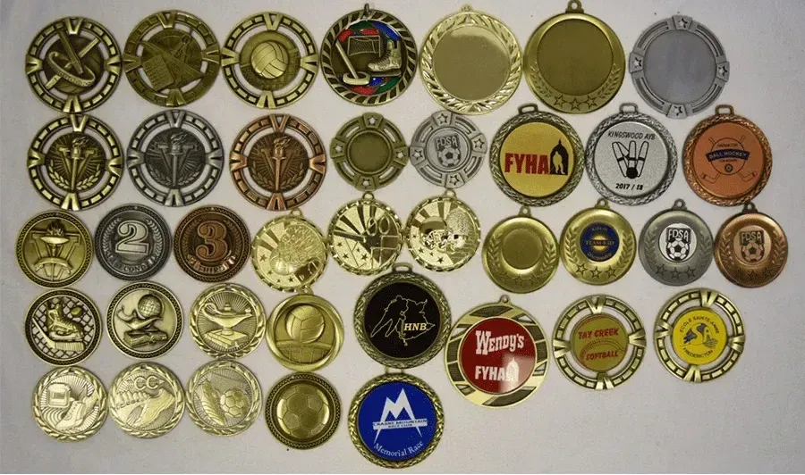 A bunch of medals with one that says final on it