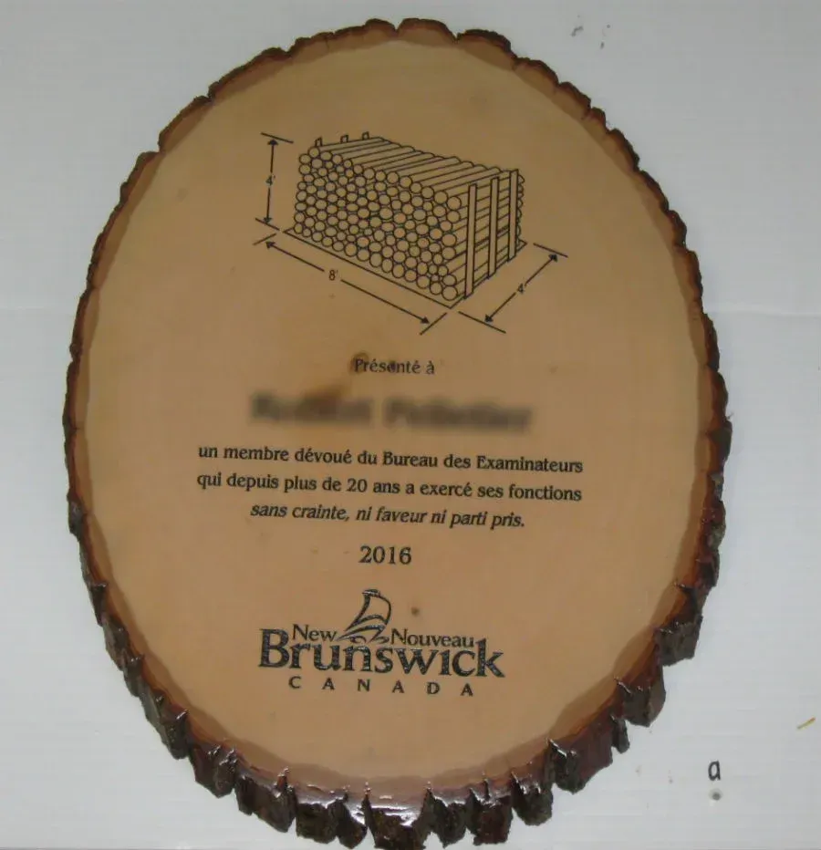 A wooden plaque from new brunswick canada