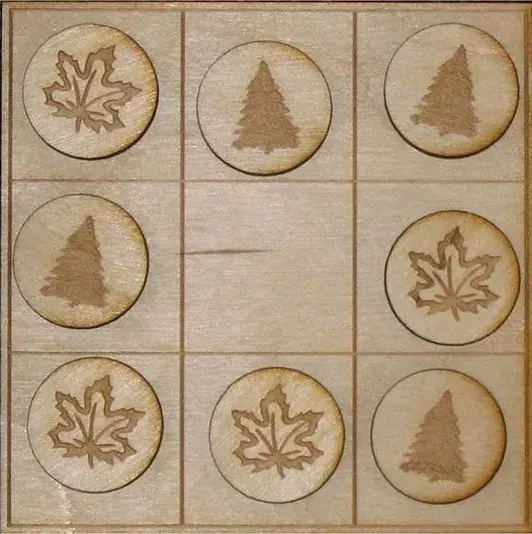 A wooden board with circles with trees and leaves on them