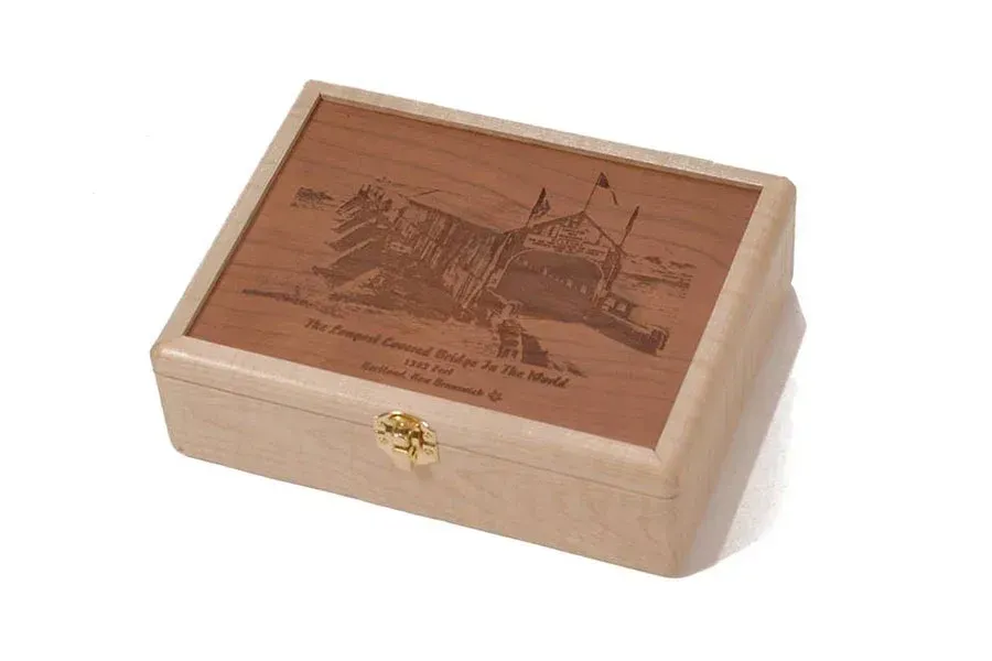 A wooden box with a picture of an ark on it.