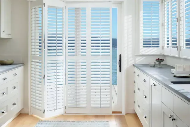 Hunter Douglas Palm Beach Polysatin shutters in kitchen, Boston MA, Simply Windows