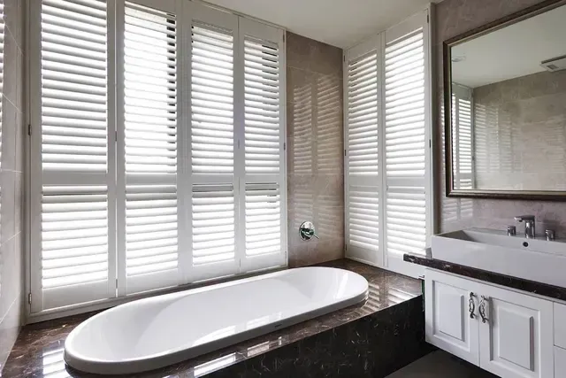 Norman Woodlore Plus shutters in bathroom, Boston MA, Simply Windows