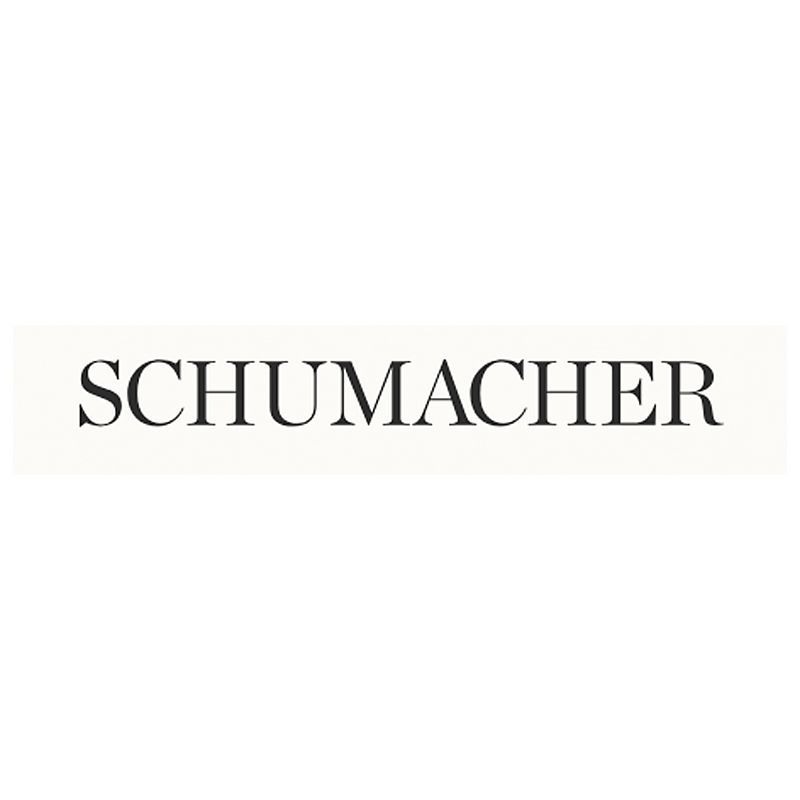 Schumacher logo in black text on cream rectangle.