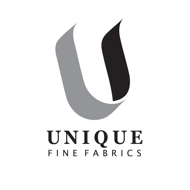 Logo for Unique Fine Fabrics, featuring a stylized