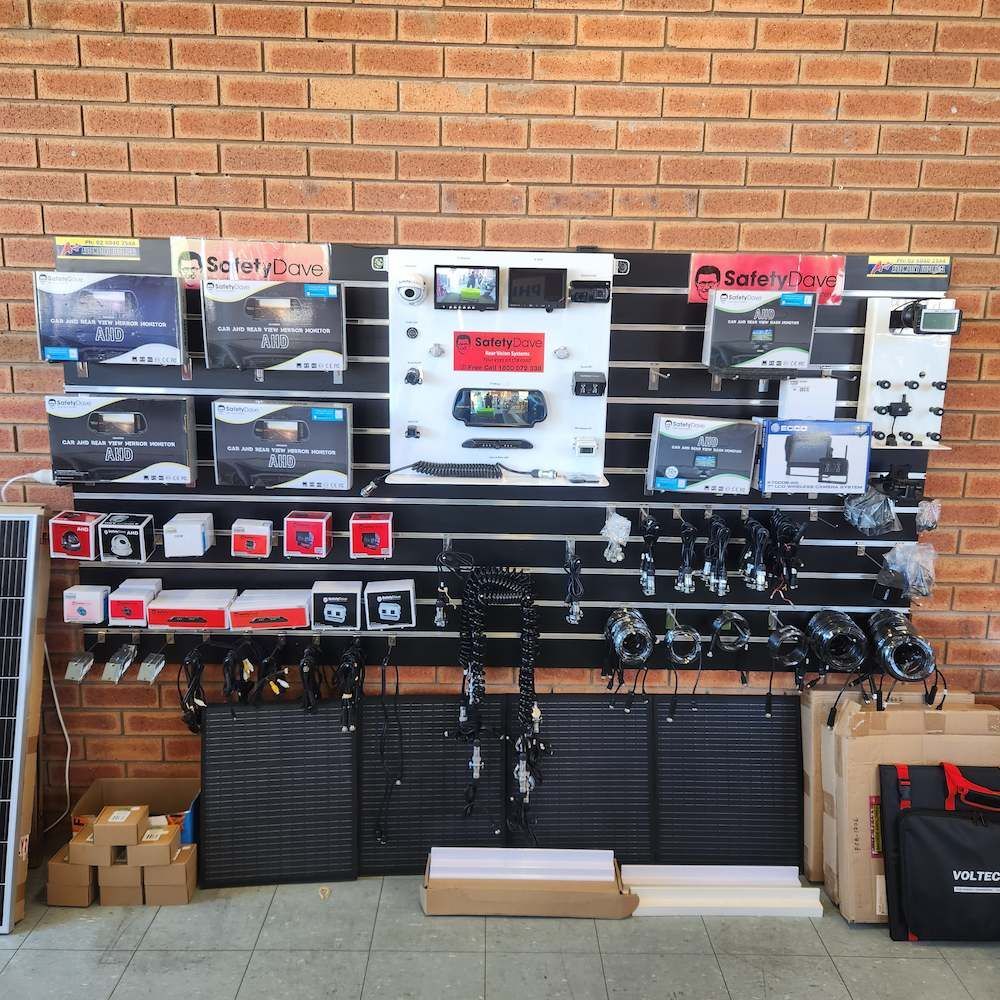 A Brick Wall with A Display of Solar Panels — A Plus Automotive Electrical in Lavington, NSW