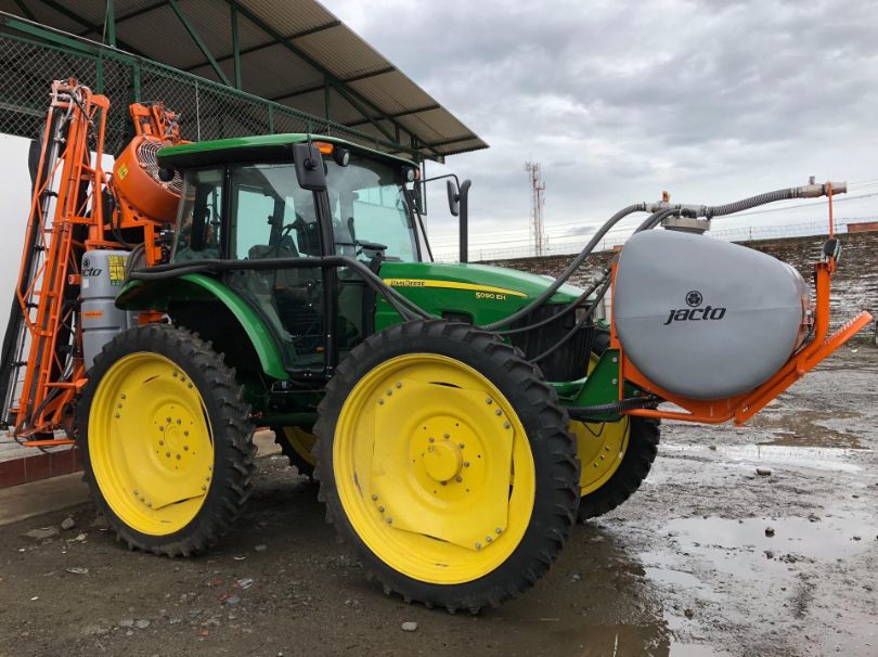 A John Deere Tractor With a Sprayer Attached to It — A Plus Automotive Electrical in Lavington, NSW