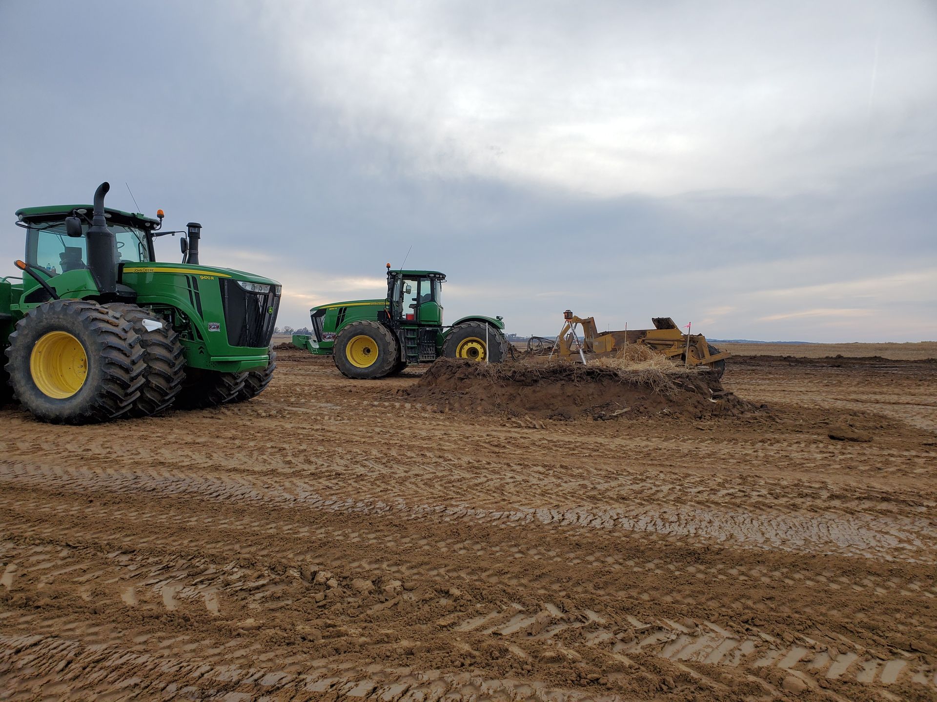 an image of a heavy equipment clearing a debri