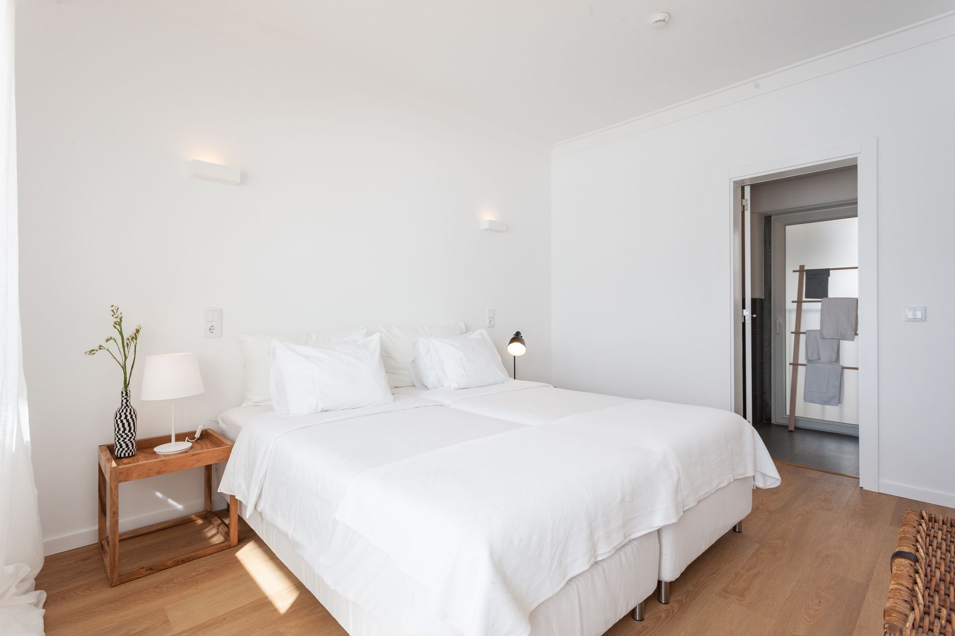 there is a large bed in the middle of the room .