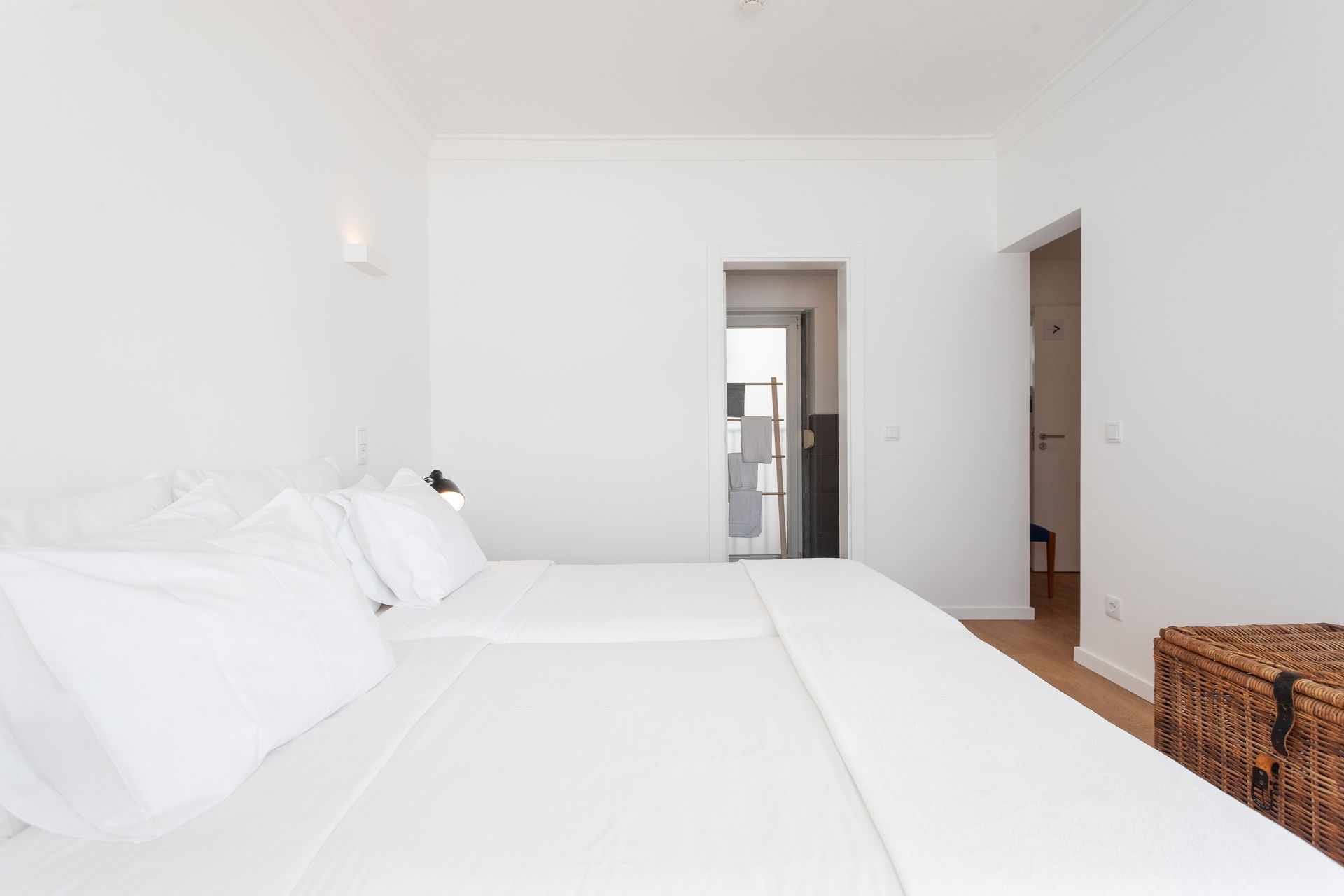 there is a large bed in the middle of the room .