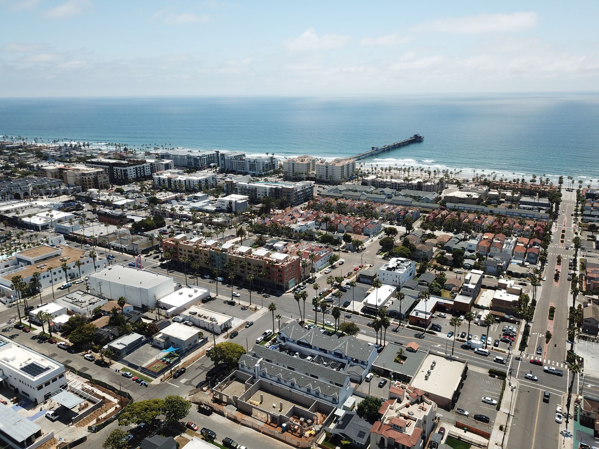Aerial view of the property with the ocean in the back