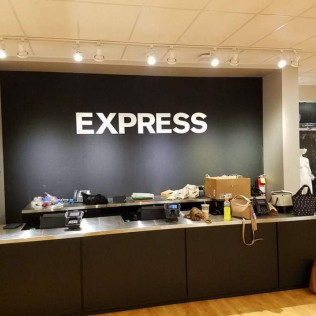 Express store checkout counter with the logo