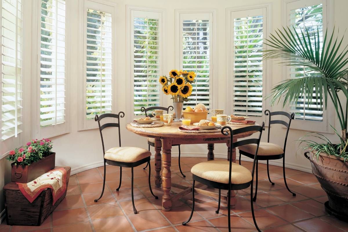 Hunter Douglas shutters featured as a unique window treatment for a bay window near Florence, KY