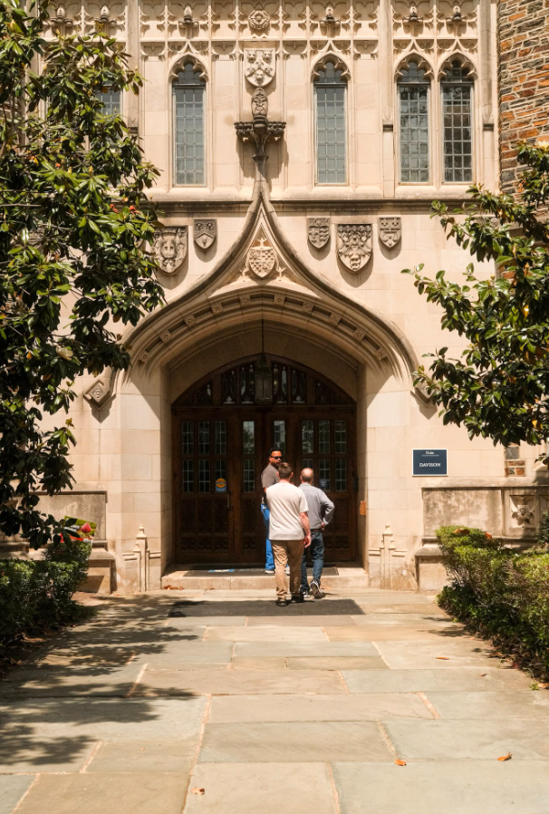 Hall-Wynne Care Team walking in the Davidson building on Duke Campus 