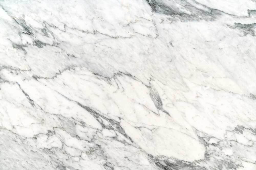 A close up of a white marble texture.