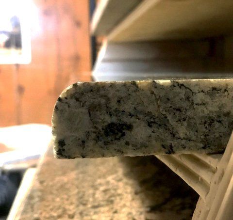 A close up of a piece of granite on a counter