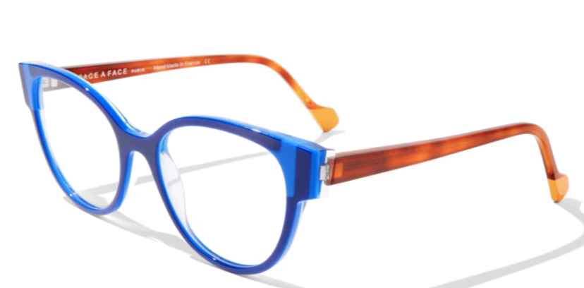 Lunettes bleues avec branches marron écaille et touches orange, sur fond blanc.