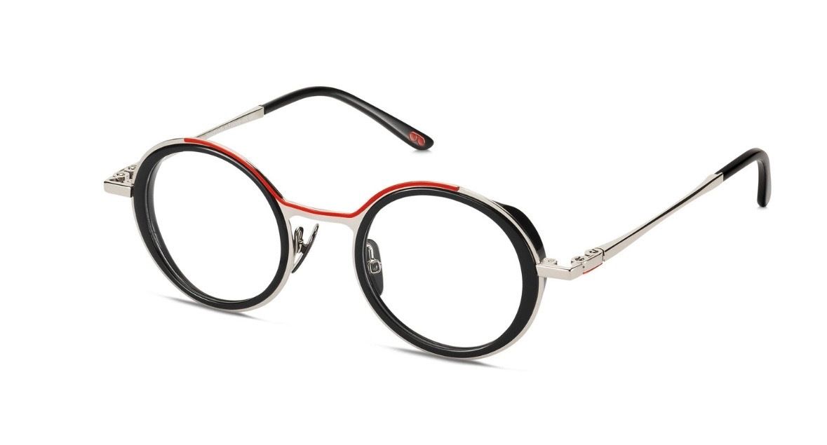 Lunettes géométriques roses et dorées avec détails décoratifs.