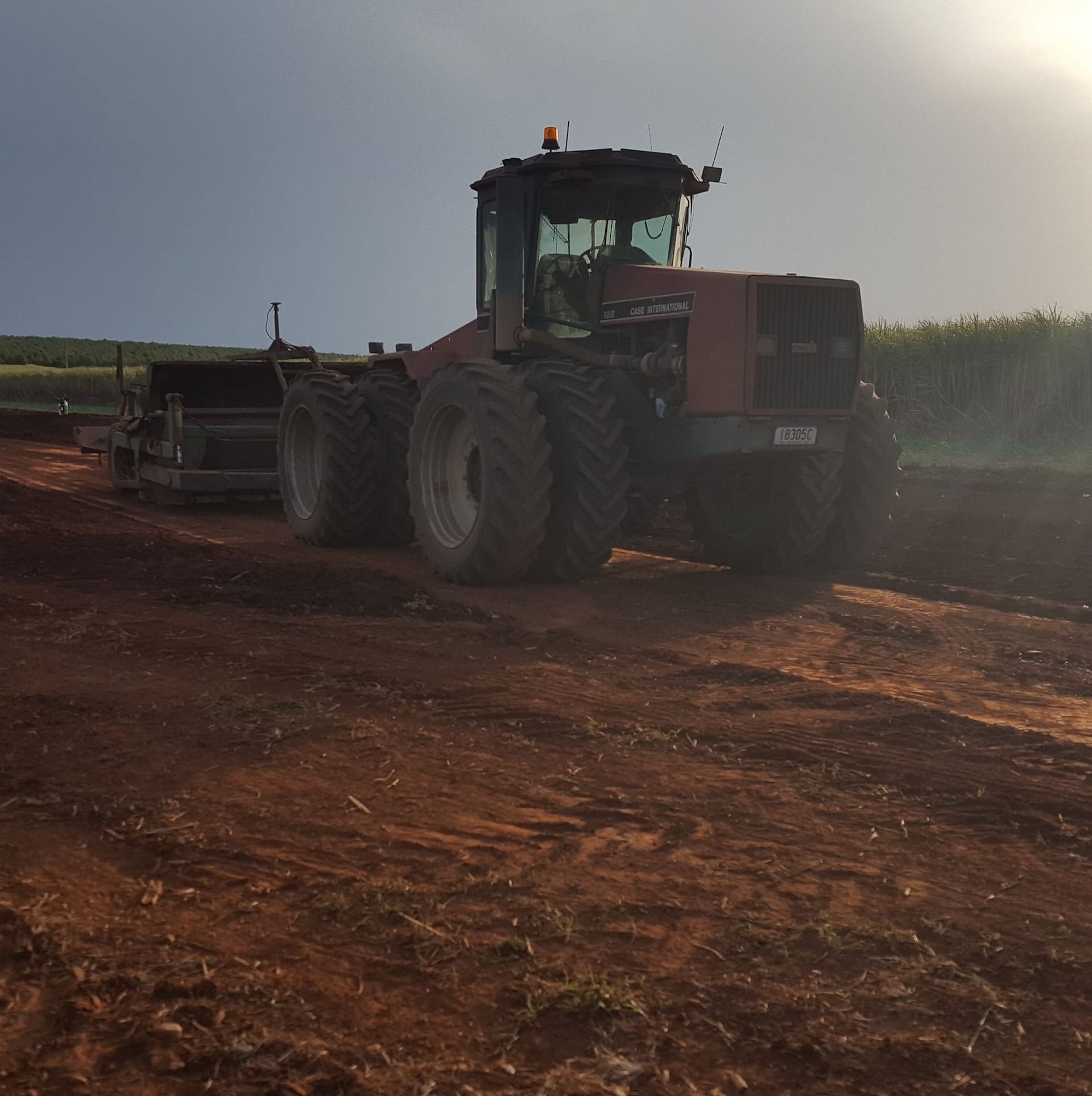 A Tractor With a License Plate That Says  a on It — B E Laser Levelling QLD in Bucca, QLD