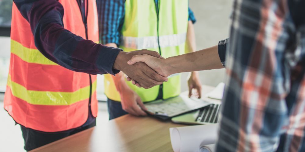 Shake hand between concrete contactor and customer
