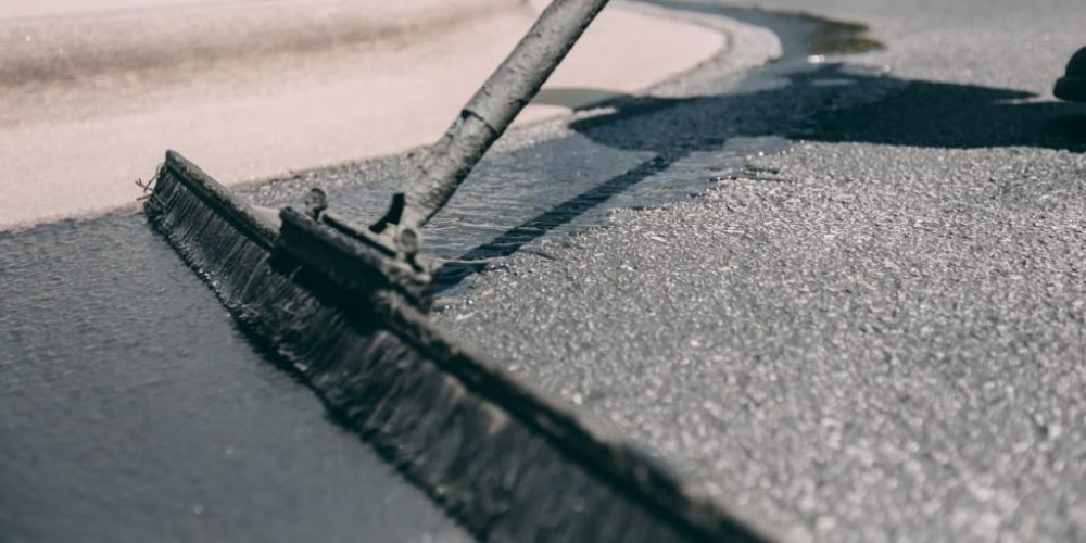 applying-second-coat-of-concrete-sealer